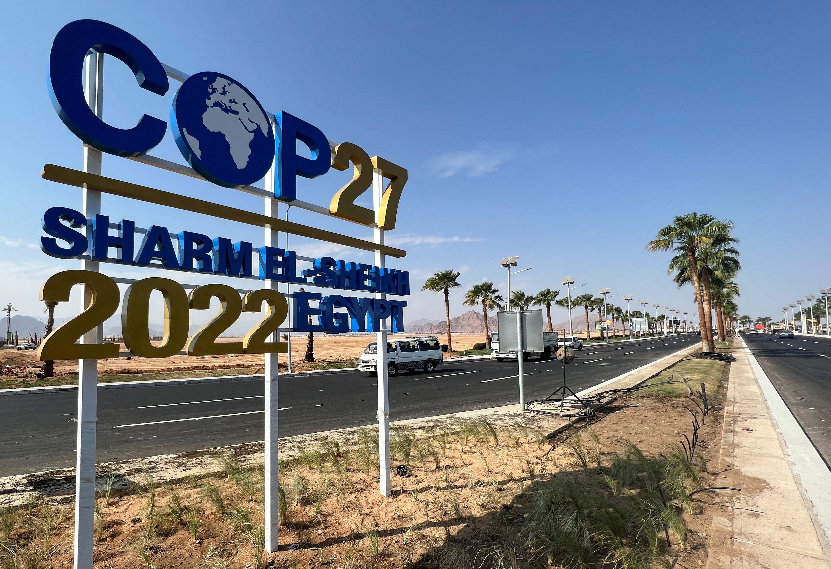 A Cop27 sign on the road leading to the conference area in Egypt’s Red Sea resort of Sharm el-Sheikh