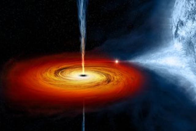 <p>An artist’s conception of the black hole Cygnus X-1 as it feeds on material siphoned off its blue giant companion star</p>