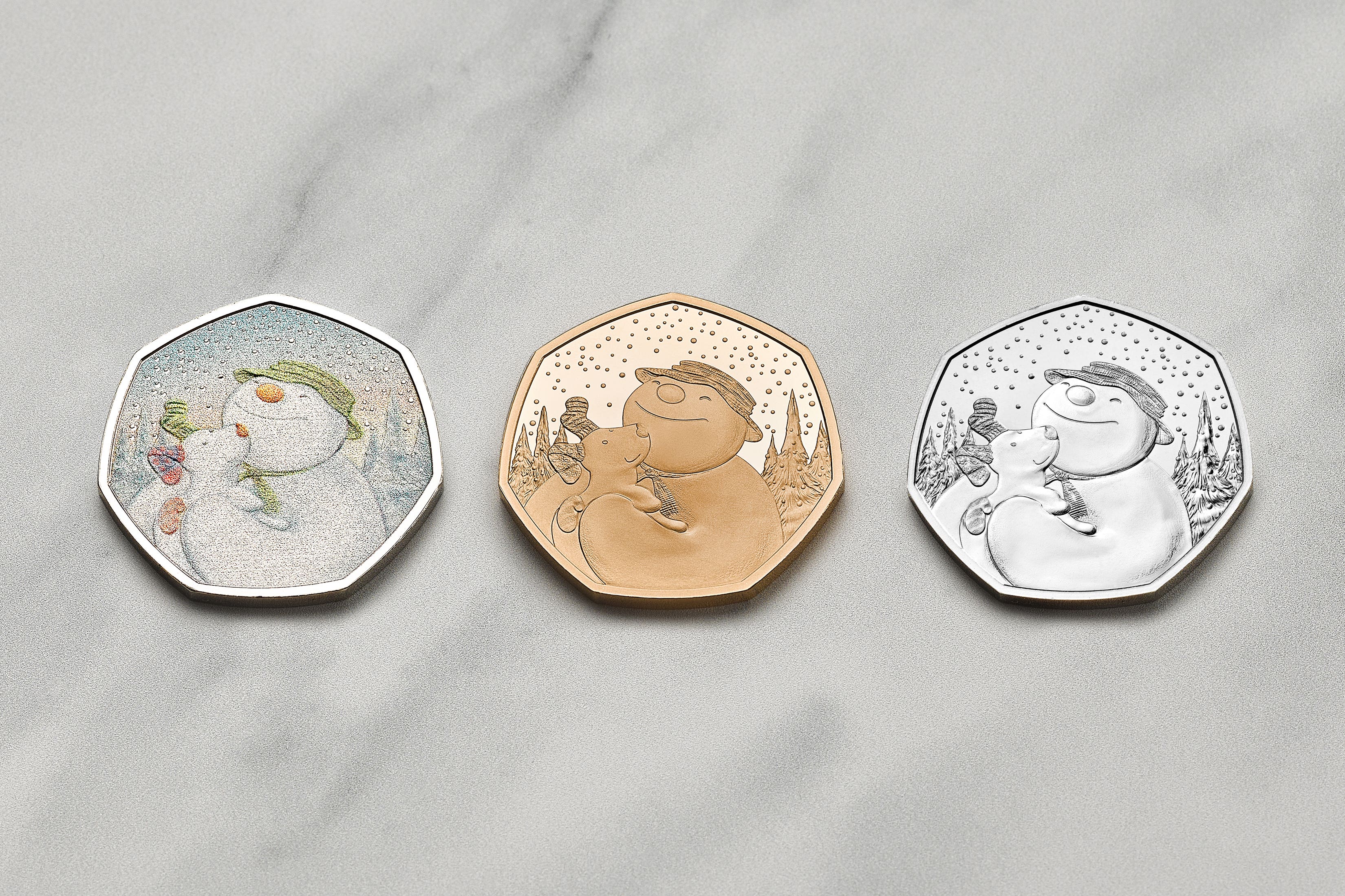 The Snowman And The Snowdog coins have been produced by the Royal Mint (Royal Mint/PA)
