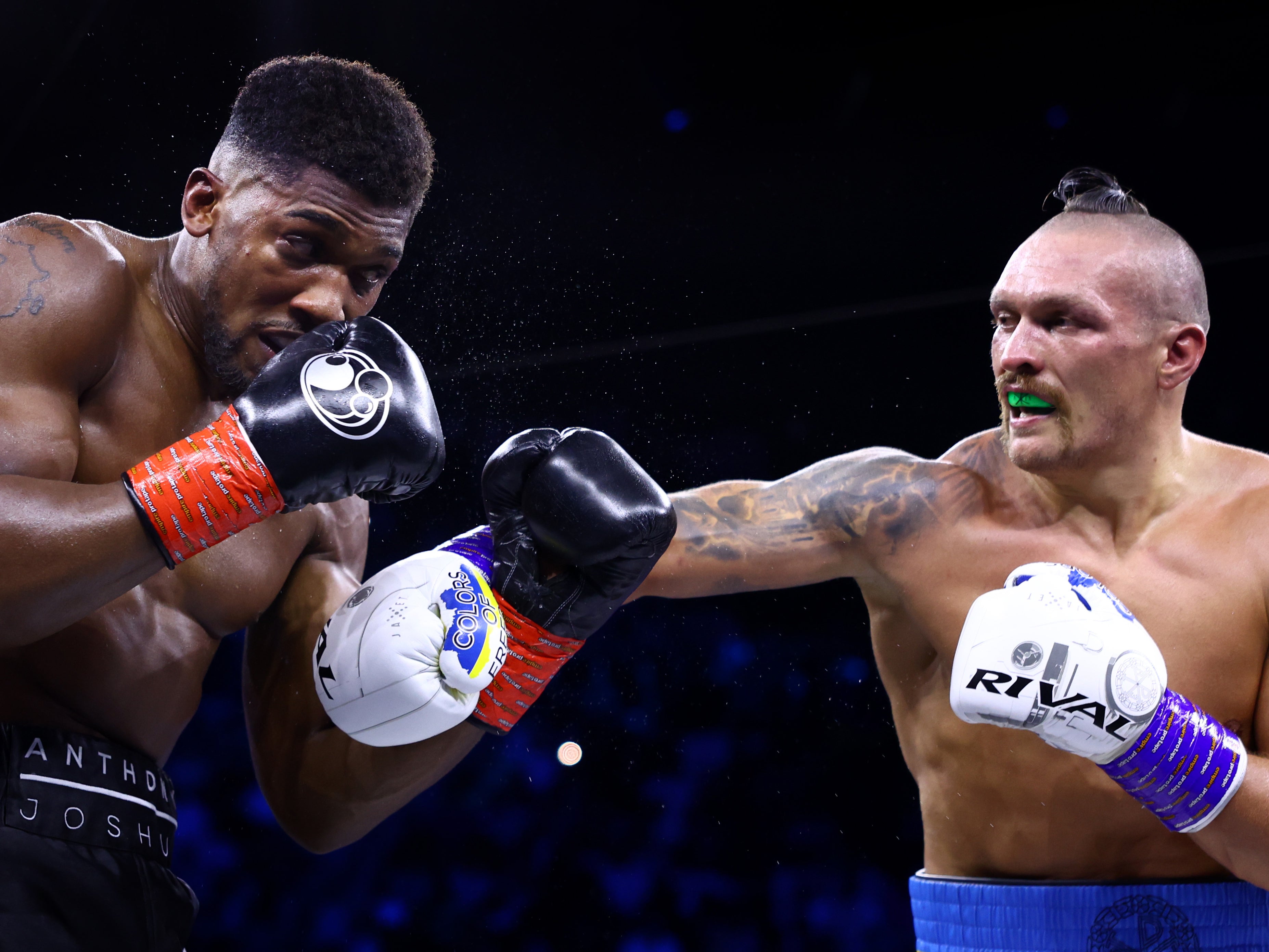 Usyk (right) last fought in August, outpointing Anthony Joshua for the second fight in a row