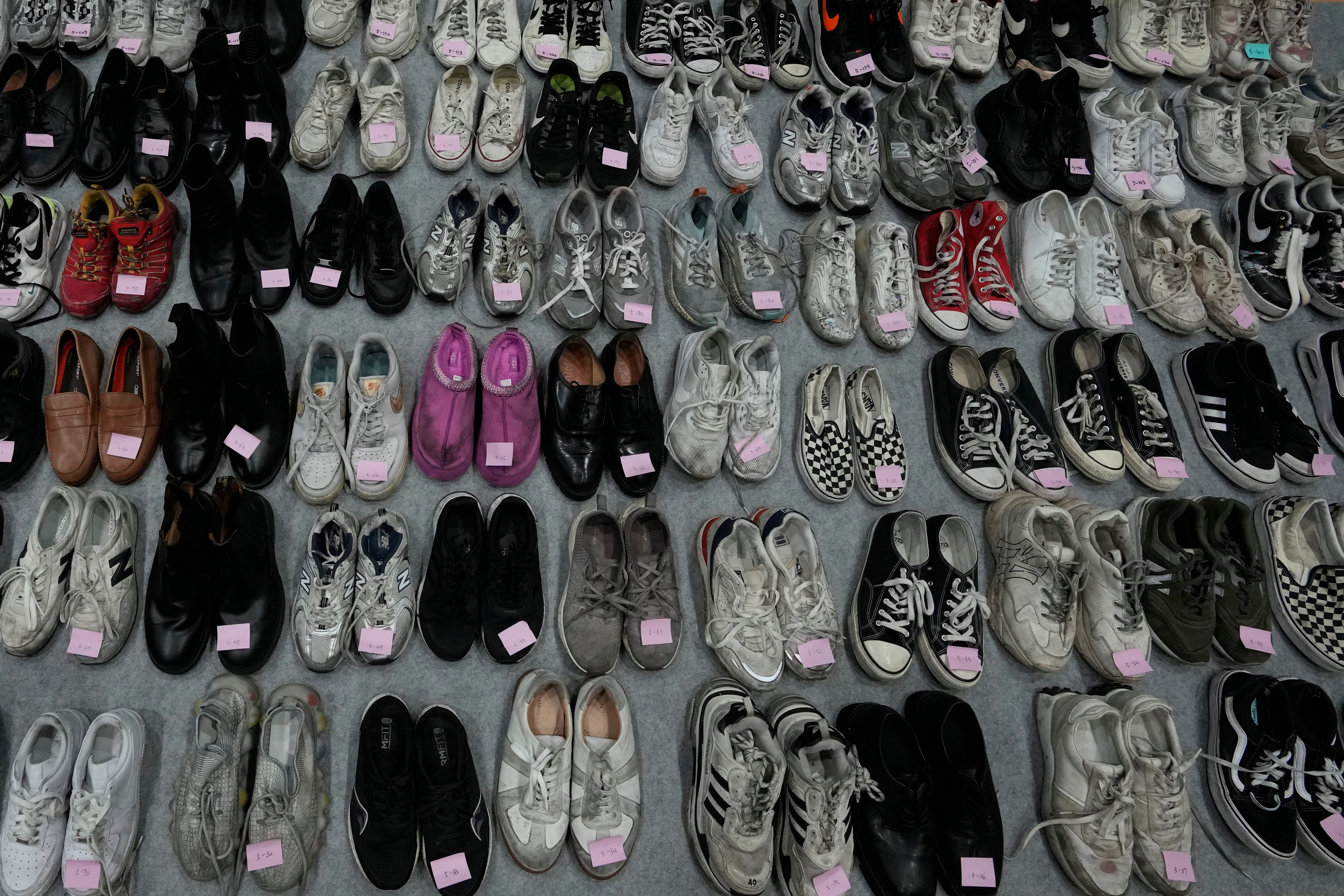 Shoes are seen among a huge collection items found in Itaewon following South Korea’s deadliest crowd surge