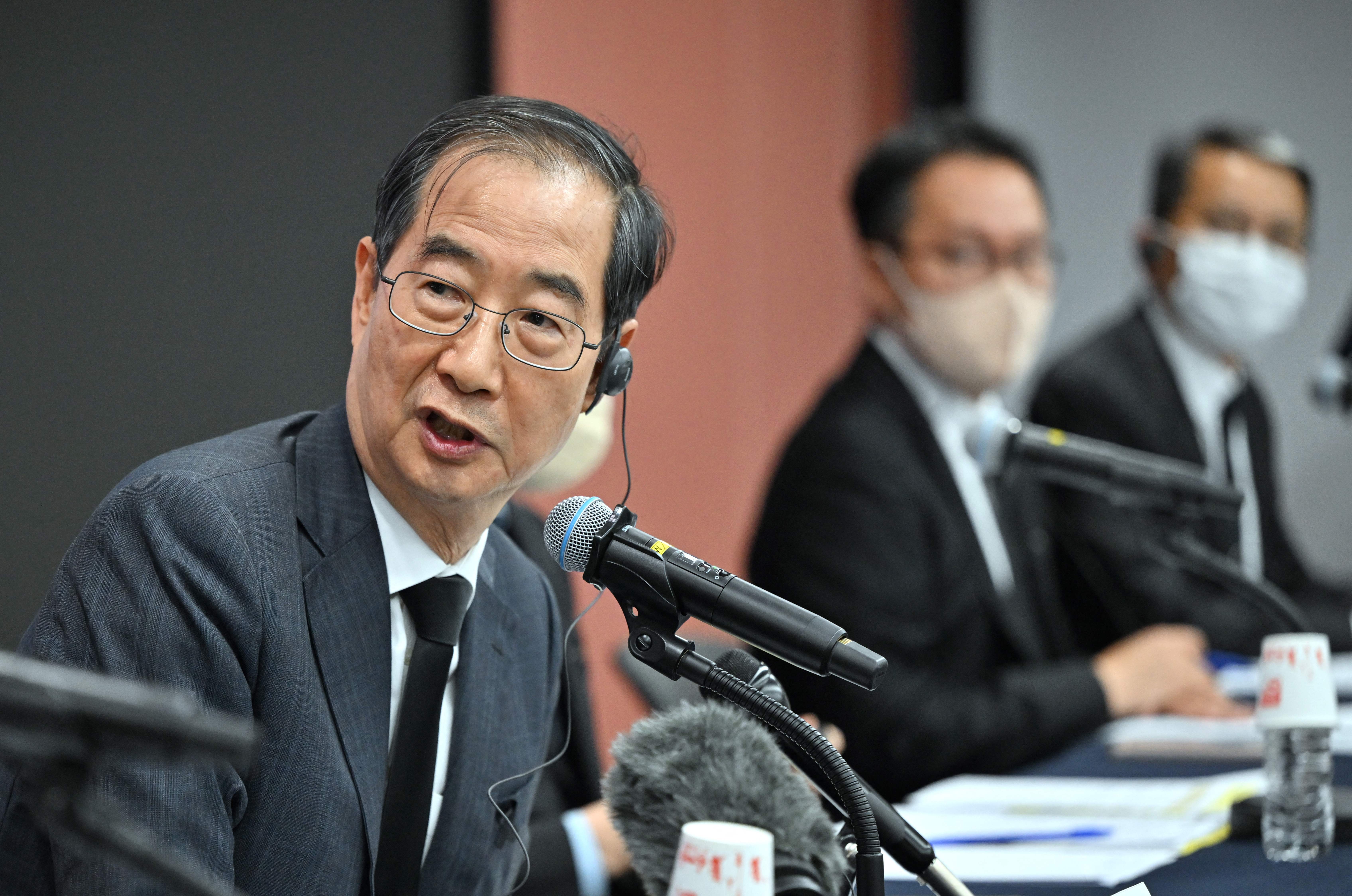 South Korea’s Prime Minister Han Duck-soo speaks during a media briefing on the fatal Halloween crowd surge that killed over 150 people, at Korea’s Culture and Information Service Center in Seoul on 1 November 2022