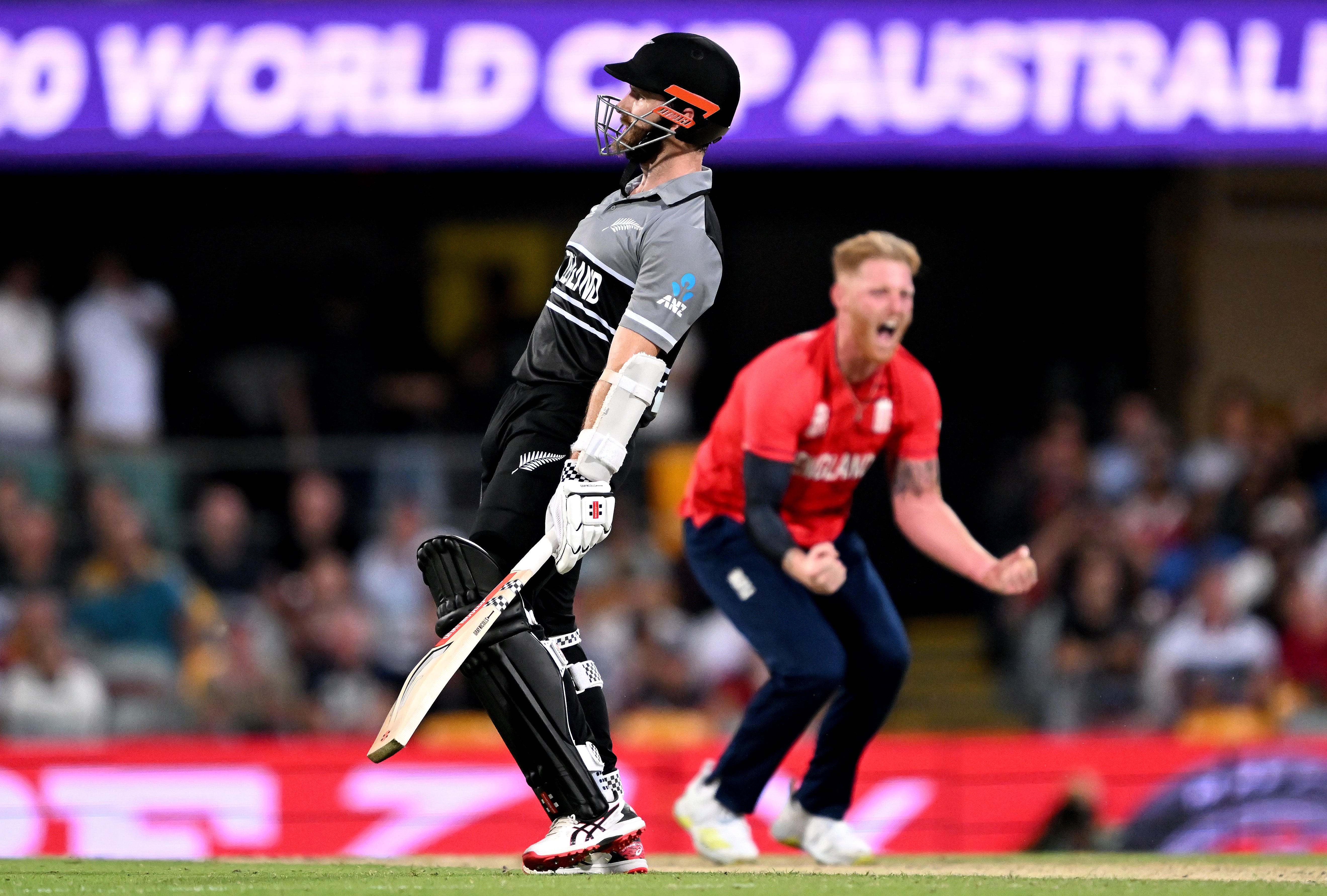 England kept their T20 World Cup hopes alive with a hard-won victory in Brisbane