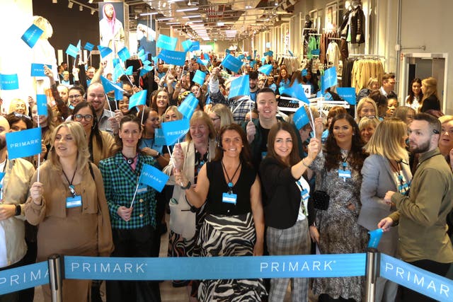 Staff at the Primark store in the historic Bank Buildings in Belfast welcomed shoppers back after years of restoration work following a fire (Liam McBurney/PA)