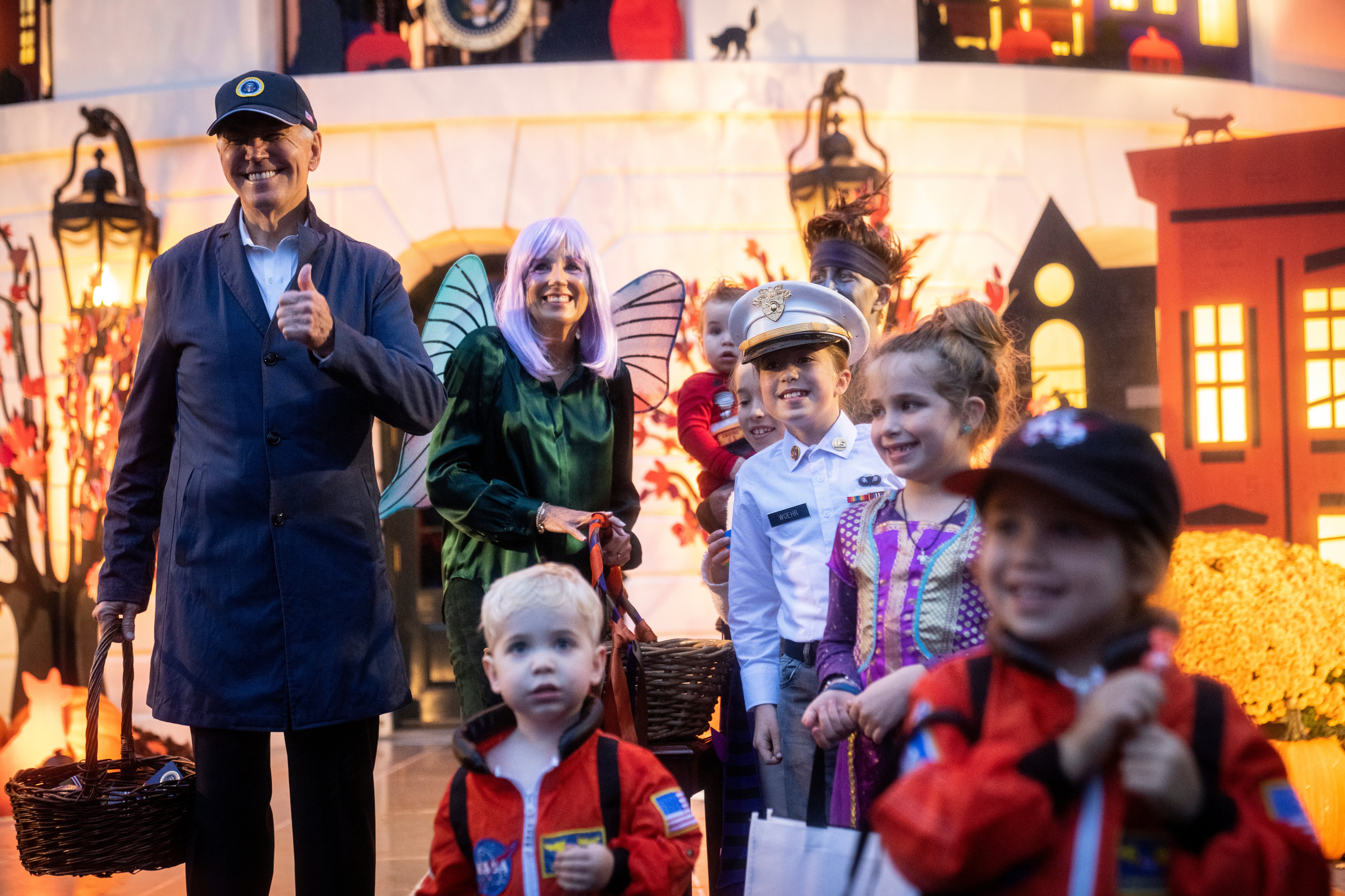 U.S. President Joe Biden and first lady Jill Biden greet trick-or-treaters during a Halloween event on the South Lawn of the White House October 31, 2022 in Washington, DC