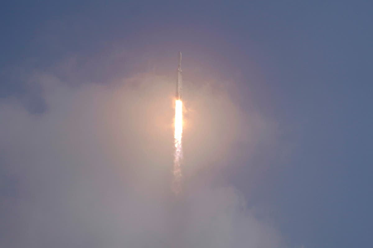 SpaceX nails booster landings after foggy military launch