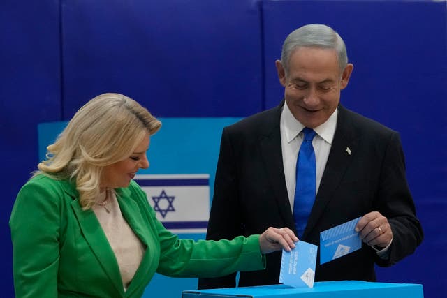 <p>Netanyahu and his wife Sara cast their ballots in Jerusalem</p>