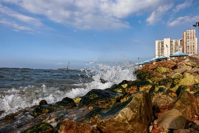 <p>Waves crash along the concrete blocks installed to break them along the Mediterranean sea waterfront in Egypt’s northern Mediterranean coastal city of Alexandria on October 31, 2022</p>
