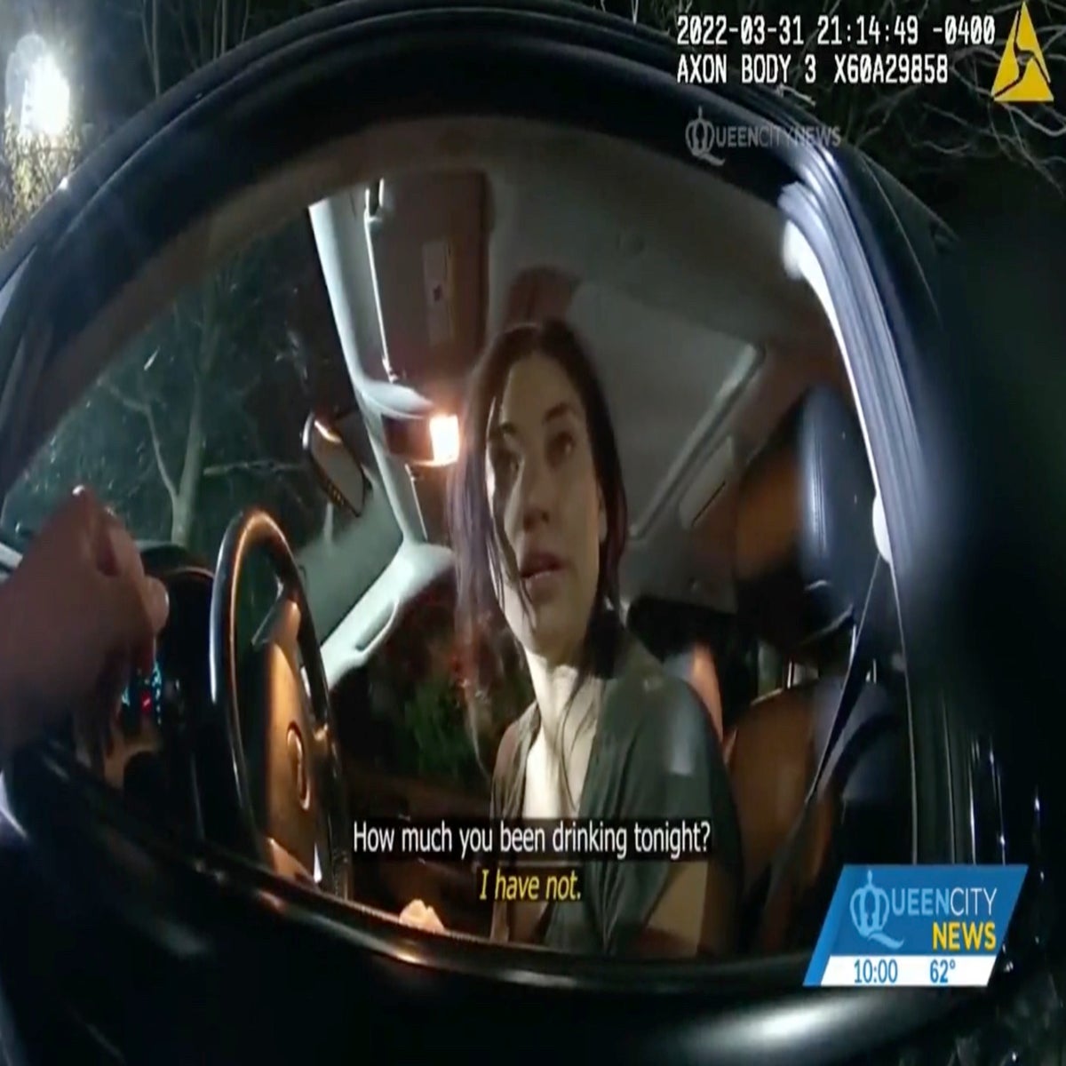 Bodycam view of a woman inside a vehicle