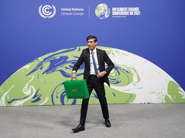 <p>Rishi Sunak at Cop26 in Glasgow. He said he would not attend this year’s summit in Egypt, then changed his mind at the last minute</p>