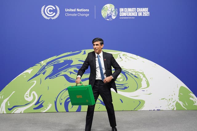 <p>Rishi Sunak at Cop26 in Glasgow. He said he would not attend this year’s summit in Egypt, then changed his mind at the last minute</p>