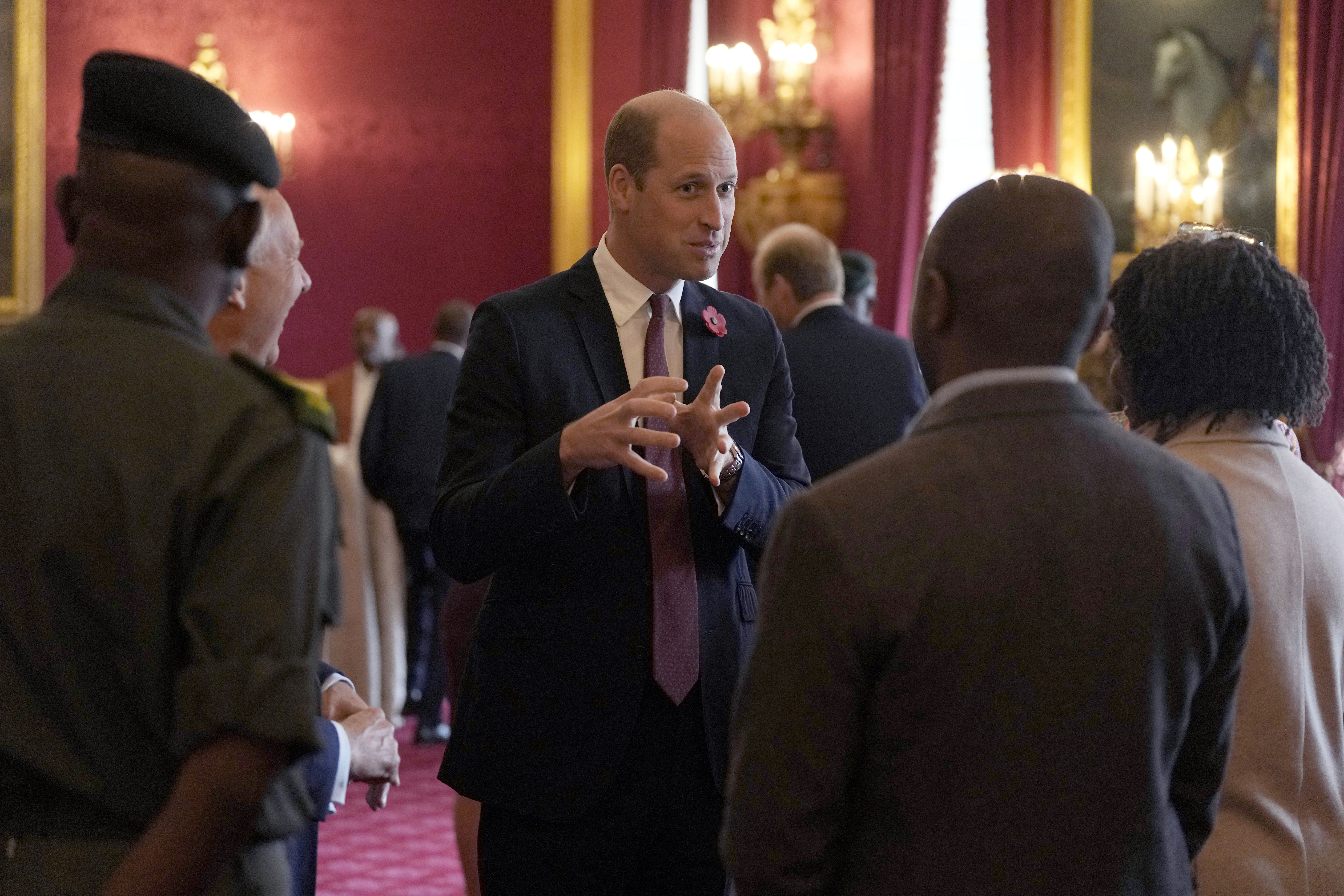 The Prince of Wales speaks with Tusk Conversation Awards winners during a symposium at St James’s Palace (Alastair Grant/PA)