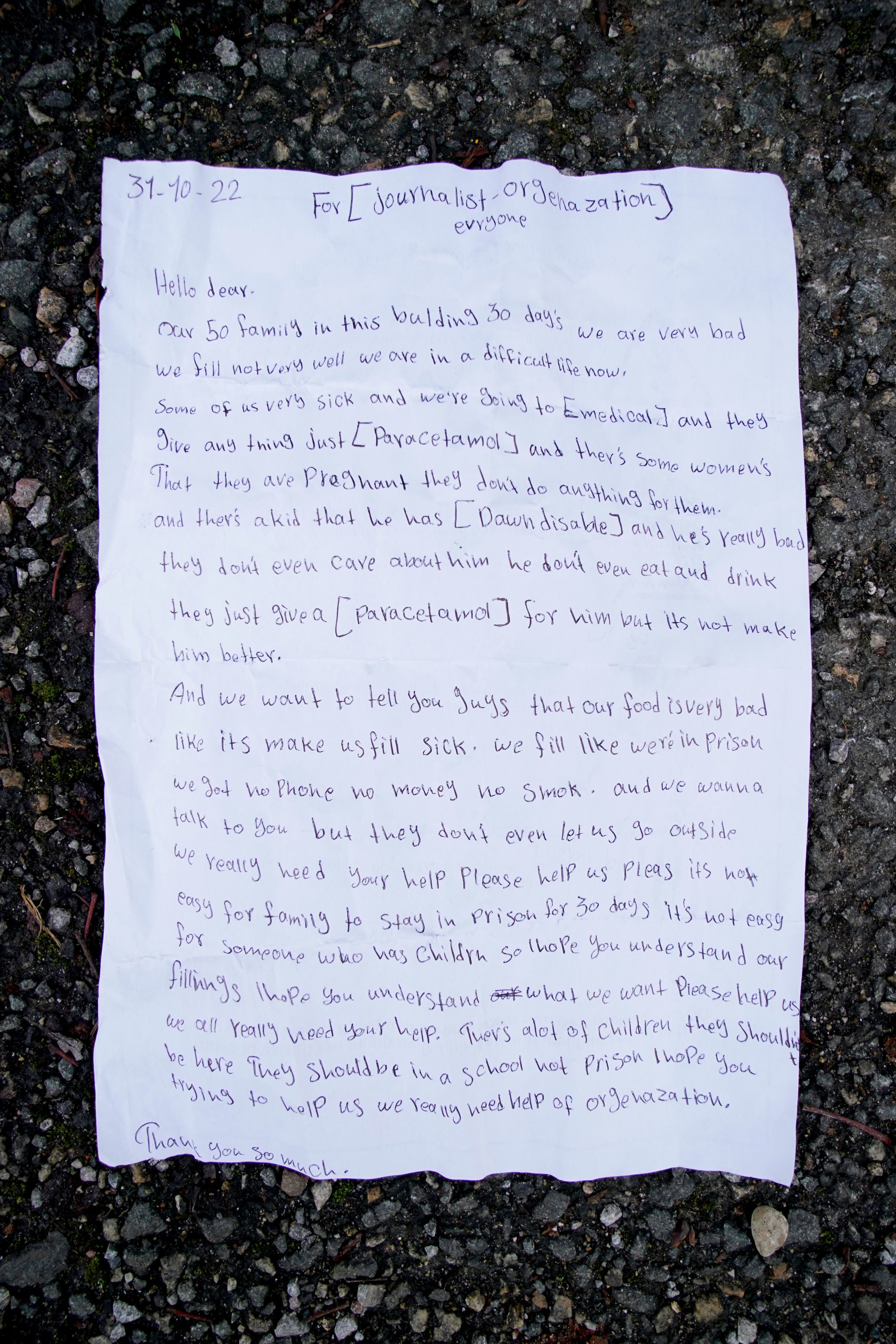 The letter thrown by a young girl over the fence at the Manston immigration facility