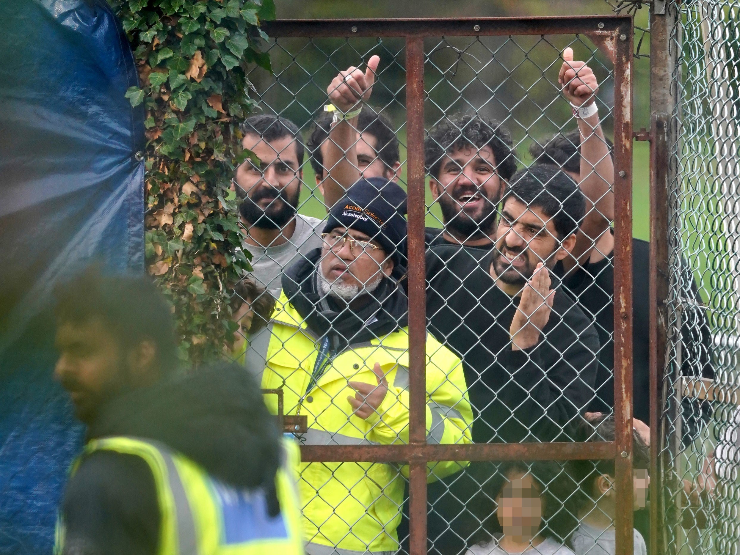 Migrants at the Manston immigration short-term holding facility on Tuesday