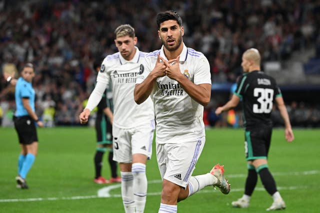 <p>Marco Asensio celebrates after scoring Real Madrid’s fourth goal</p>
