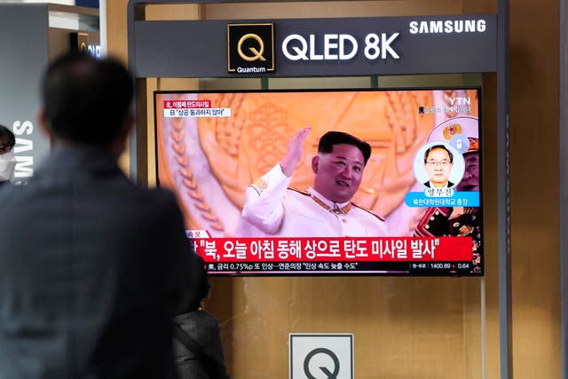 <p>A TV screen showing a news programme reporting about North Korea’s missile launch with file footage of North Korean leader Kim Jong-un on display at the Seoul Railway Station in Seoul, South Korea</p>