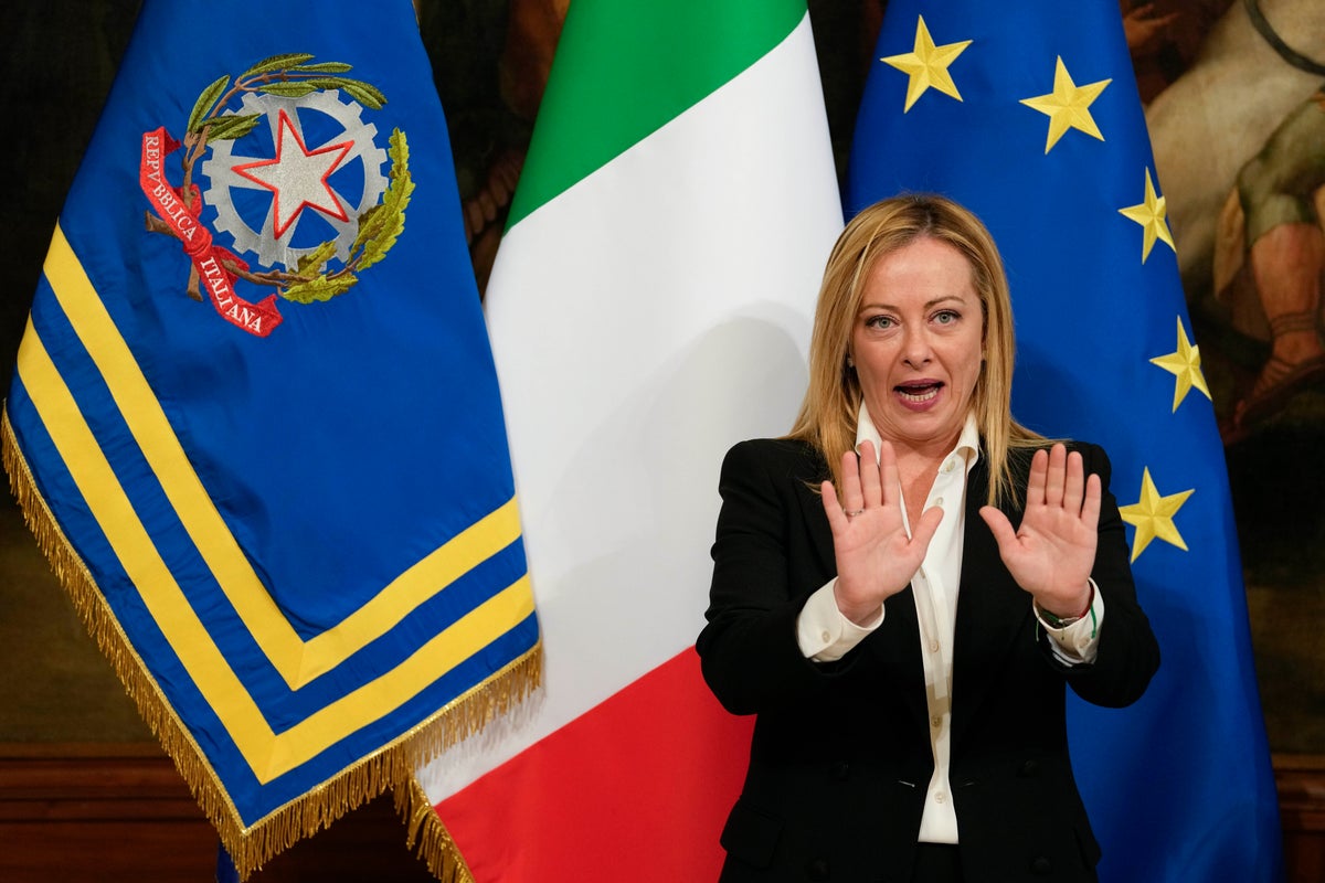 Georgia Italy Ruler Italy’s new, far-right leader heads to EU HQ to break ice | The Independent
