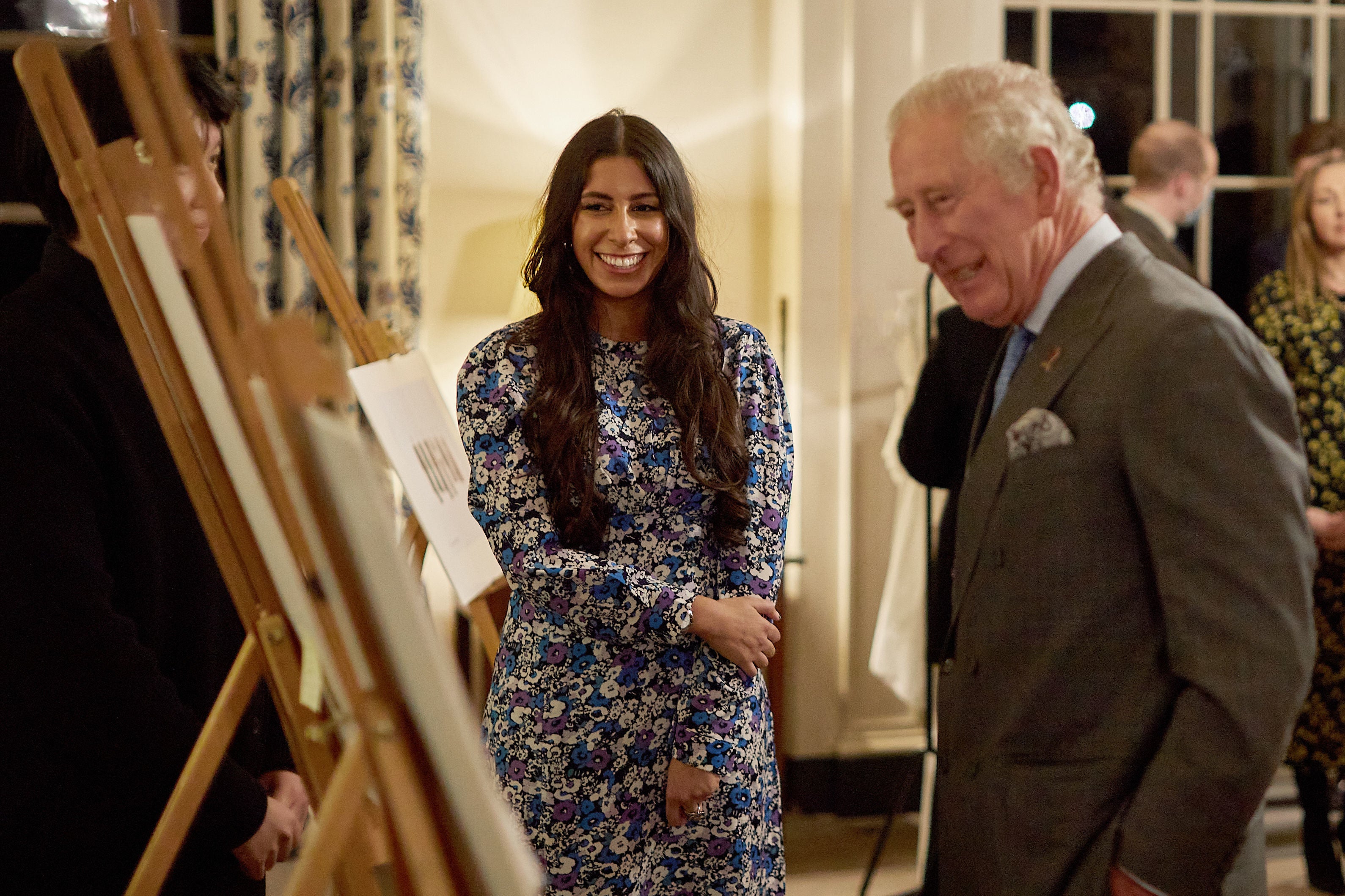 Photo issued by Yoox Net-A-Porter of the then Prince of Wales (now King Charles III) with modern artisan Isabelle Pennington-Edmead as they admire her fashion designs on show at Highgrove House