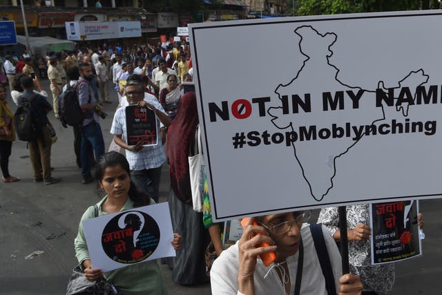 <p>File photo: Indian demonstrators take part in a protest against a spate of  murders targeting minorities under the pretext of protecting cows in Mumbai on 3 July 2017</p>