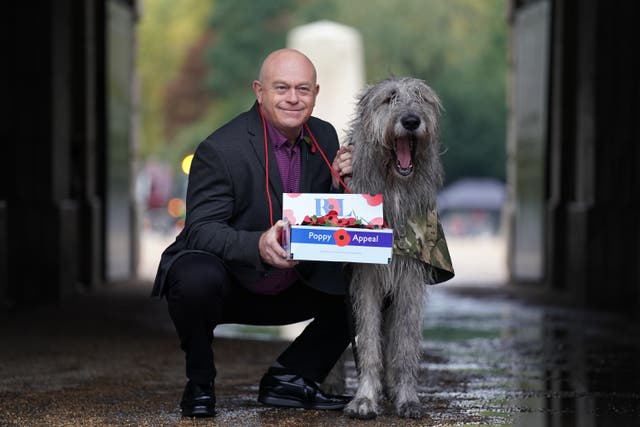 Royal British Legion ambassador Ross Kemp launches this year’s London Poppy Day, with the Irish Guards mascot Irish Wolfhound Seamus, at Horse Guards Parade, London (Kirsty O’Connor/PA)