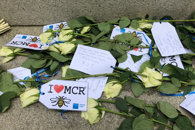 Floral tributes left in St Ann’s Square in Manchester city centre to remember the attack (PA)