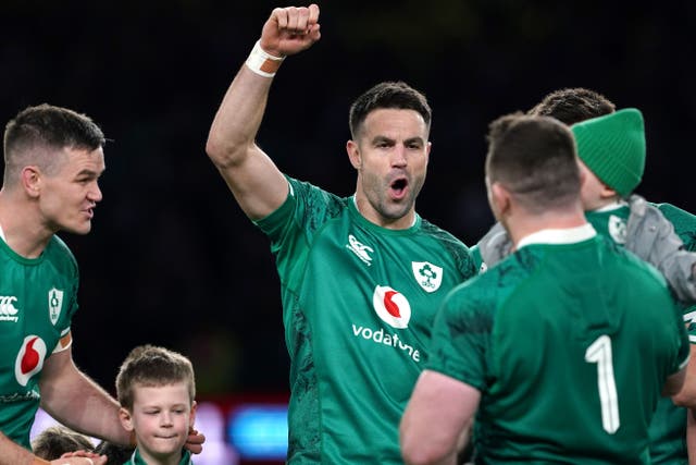 Conor Murray, centre, will join Johnny Sexton, left, and Cian Healy, right, on Ireland’s list of Test centurions (Brian Lawless/PA)