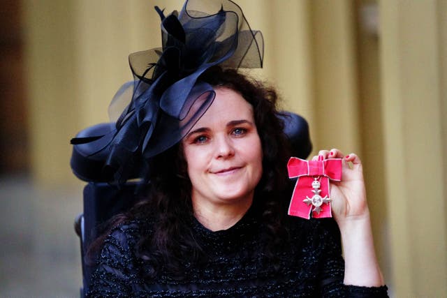 Actress Cherylee Houston after being made a Member of the Order of the British Empire by the Princess Royal at Buckingham Palace, for services to drama and to people with disabilities (Victoria Jones/PA)