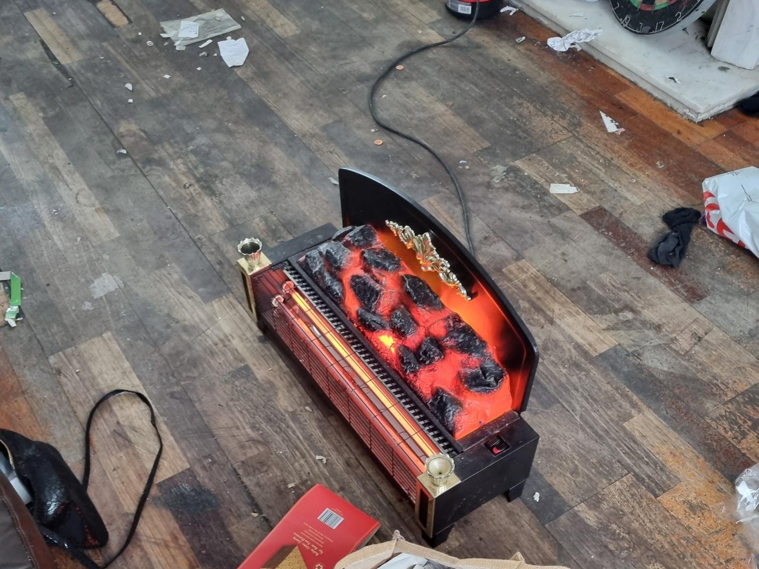 The elderly woman uses this electric heater to try and heat her house after her gas was isolated
