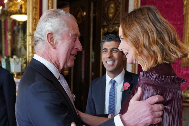 <p>King Charles greets Rishi Sunak and Stella McCartney  at a reception for world leaders</p>