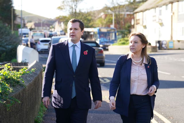 <p>Home Office minister Robert Jenrick with Natalie Elphicke, MP for the Dover constituency, during a visit to meet residents in the Aycliffe area of Dover, Kent Picture date: Friday November 4, 2022 (Gareth Fuller/PA)</p>