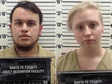 New Mexico couple charged after woman stabbed to death with three-foot metal sword