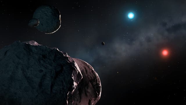 <p>An artist’s impression of the white dwarf stars WDJ2147-4035 and WDJ1922+0233, which may be among the oldest such stars, with the remains of rocky planets orbiting them in the Milky Way galaxy</p>