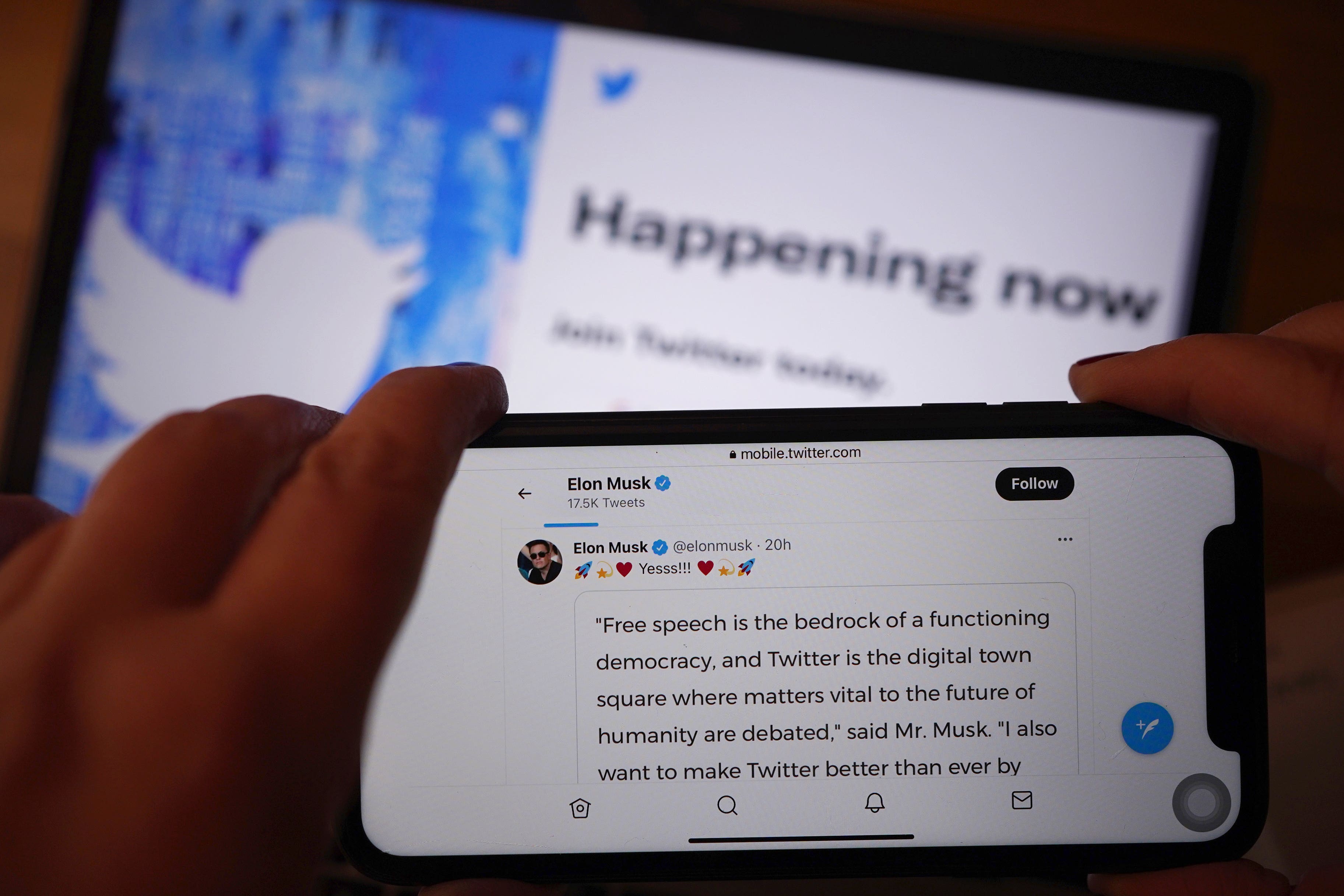 The Twitter social media app displaying a tweet by Elon Musk on a mobile phone in London, as Twitter has accepted billionaire Elon Musk’s bid to buy the company for ?34.5 billion.
