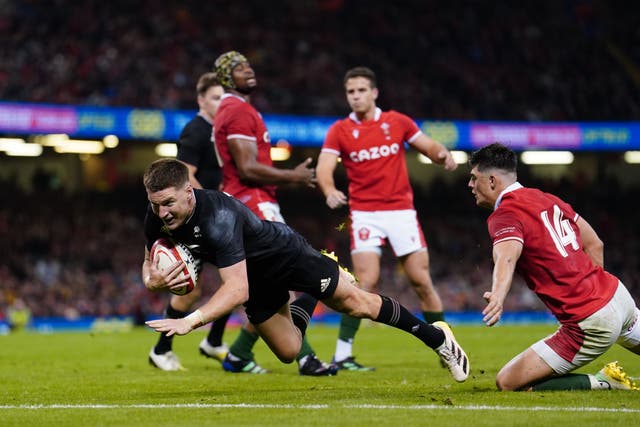 New Zealand centre Jordie Barrett breaks through to score one of the All Blacks’ eight tries in their 55-23 victory over Wales in Cardiff (David Davies/PA)