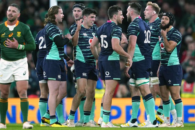 Ireland players celebrate after beating South Africa (Brian Lawless/PA)