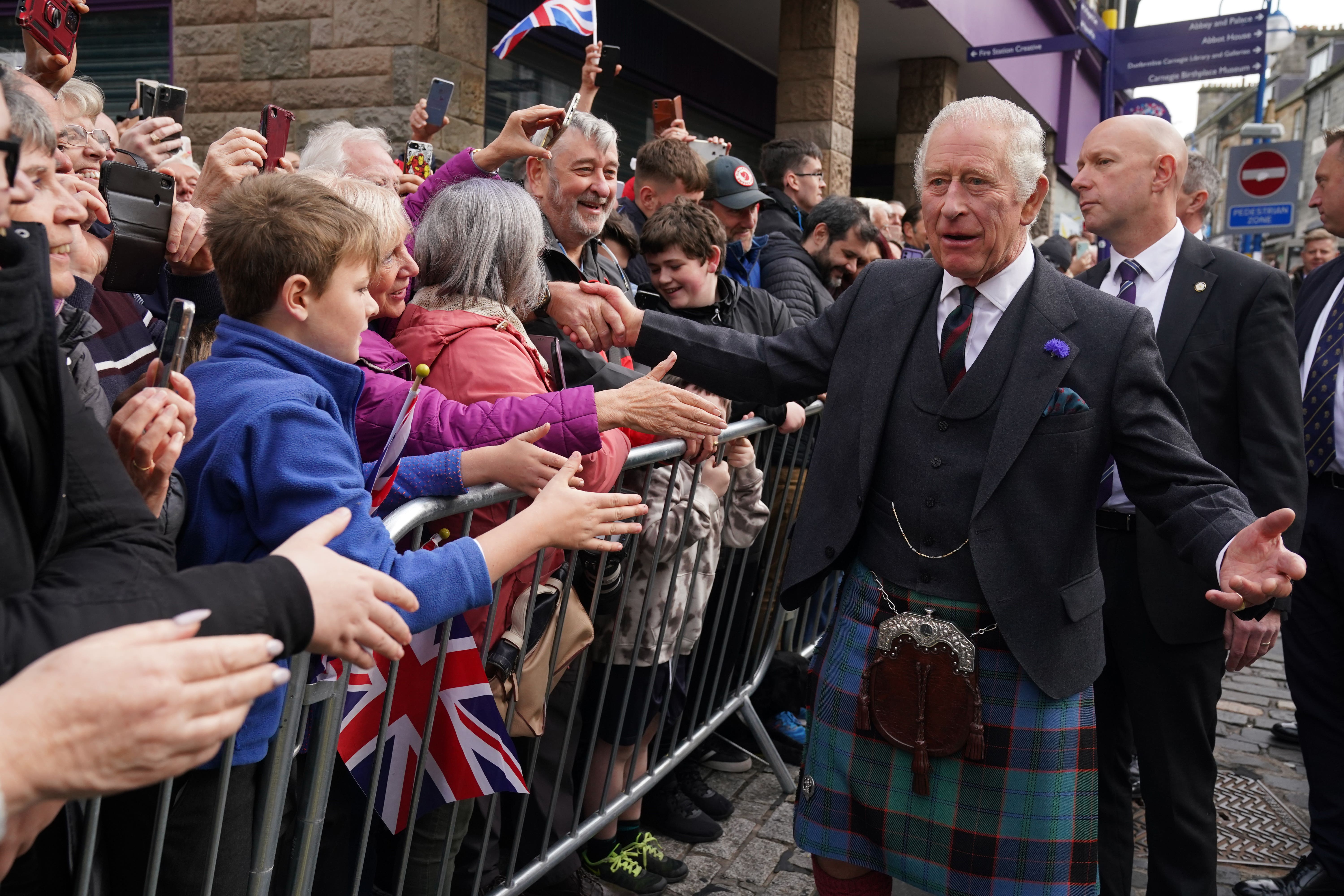The King meets people in Dunfermline, Fife (Andrew Milligan/PA)