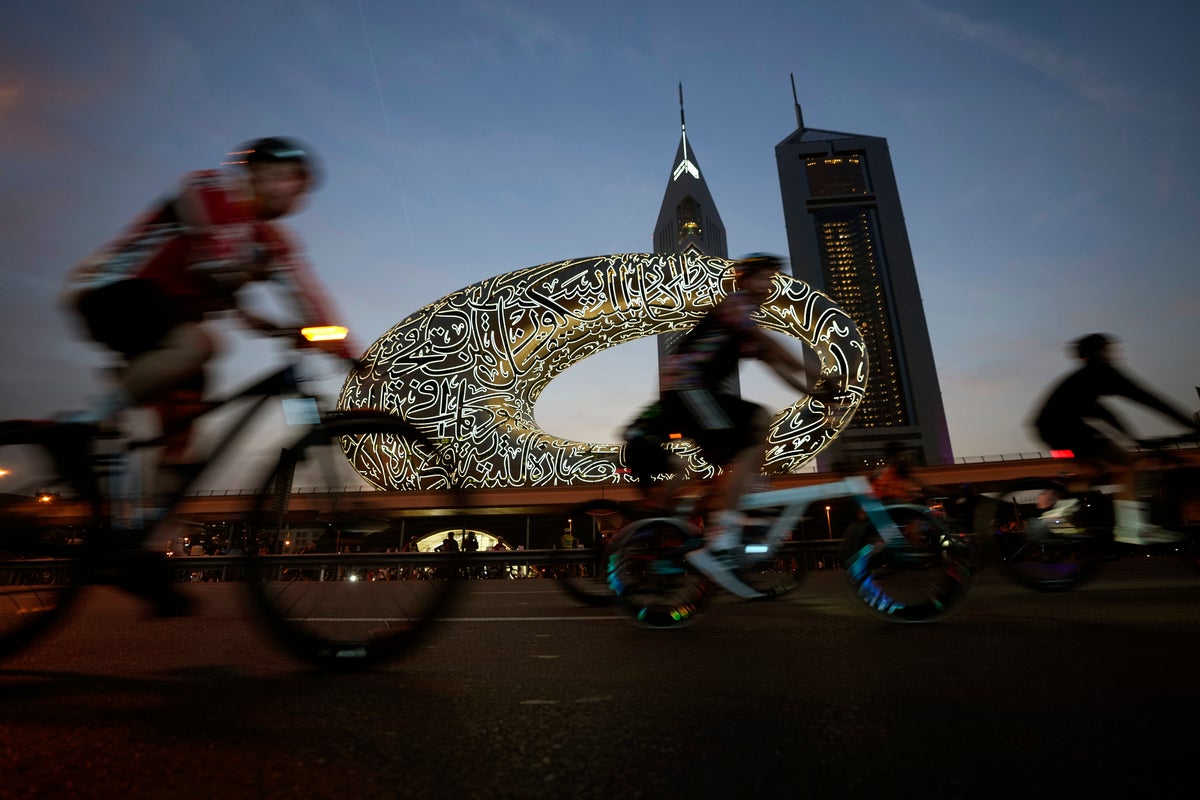 Tens of thousands ride bikes on typically busy Dubai highway