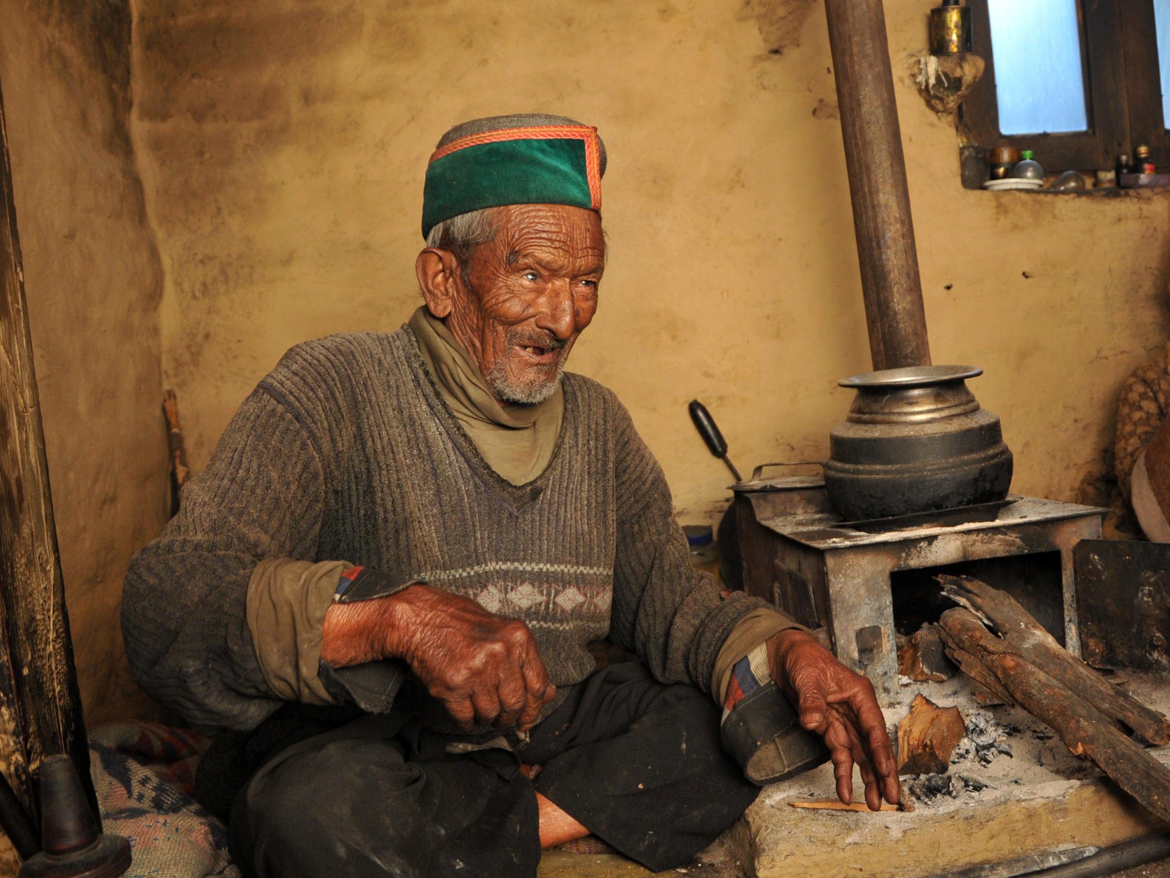 File. In this photograph taken on April 24, 2014, Indian resident Shyam Saran Negi gestures as he speaks at his home at Kalpa in Kinnaur District in the northern State of Himachal Pradesh