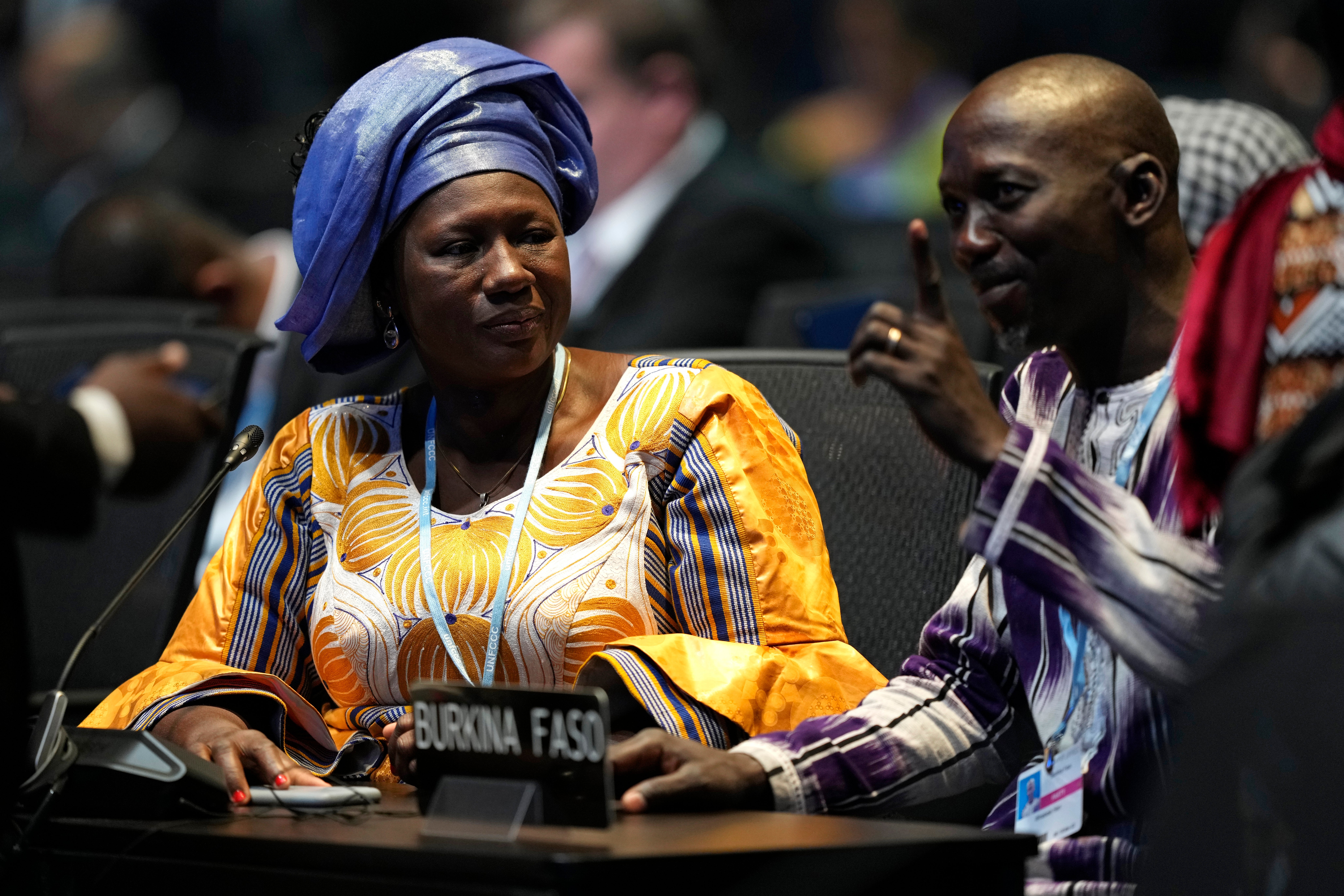 Delegates from Burkina Faso attend an opening session at Cop27
