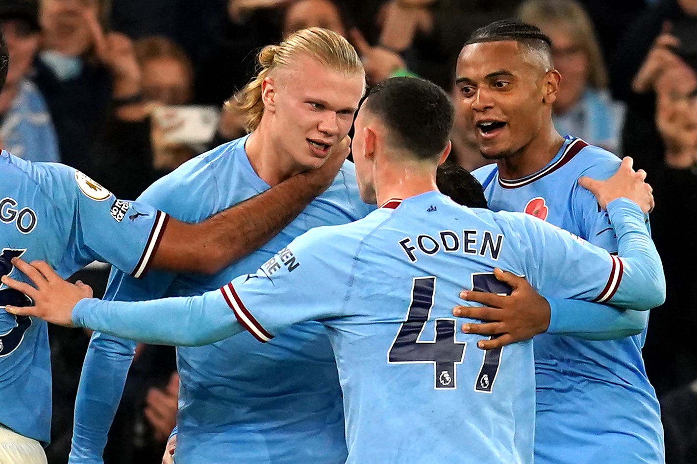 Erling Haaland, left, hit a late penalty winner for Manchester City against Fulham (Nick Potts/PA)