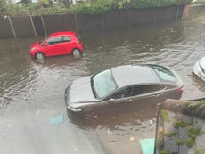 UK weather: Flooding as heavy rain lashes country with week of downpours to follow