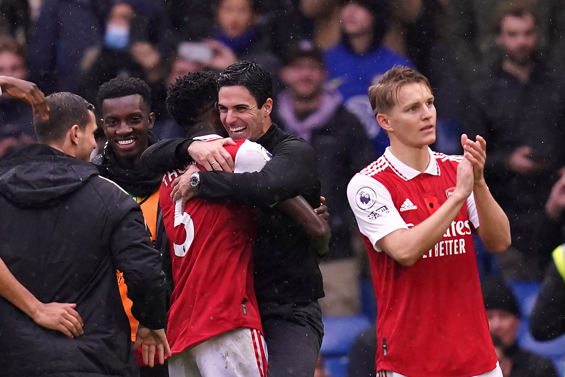 Arsenal manager Mikel Arteta and Thomas Partey celebrate after the Premier League match at Stamford Bridge, London. Picture date: Sunday November 6, 2022.