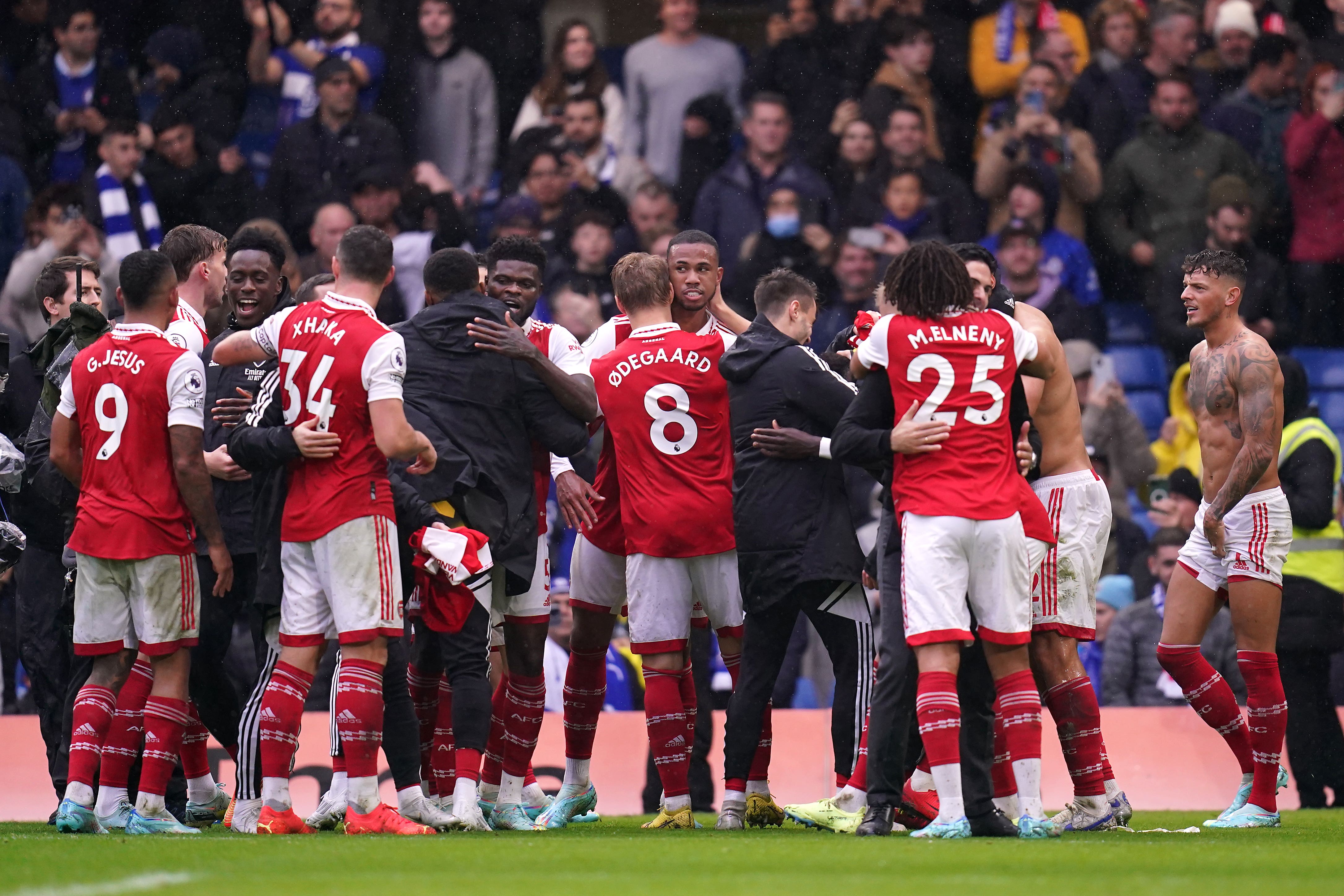 Arsenal’s players celebrate after their 1-0 win at Chelsea (John Walton/PA)