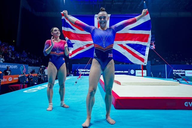 Jessica Gadirova celebrates world gymnastics gold on the floor with her sister Jennifer (Peter Byrne/PA)