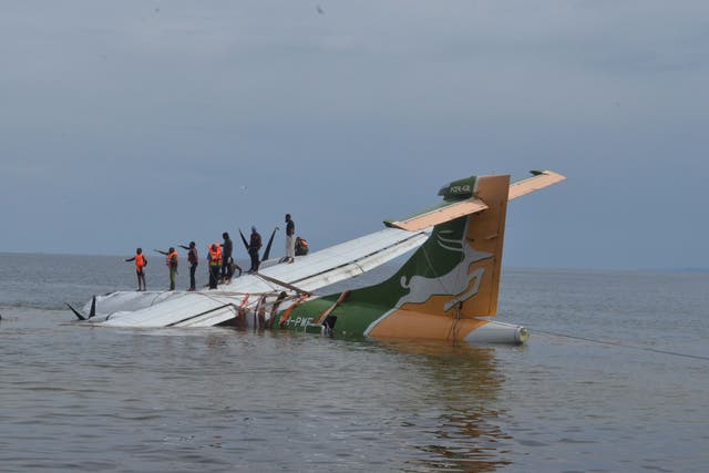 <p>Rescuers search for survivors after a Precision Air flight plunged into Lake Victoria</p>