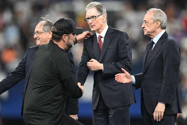 <p>Liverpool owner John Henry and manager Jurgen Klopp following the 2022 Champions League final </p>
