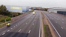 M25 brought to a standstill as Just Stop Oil activists scale gantry