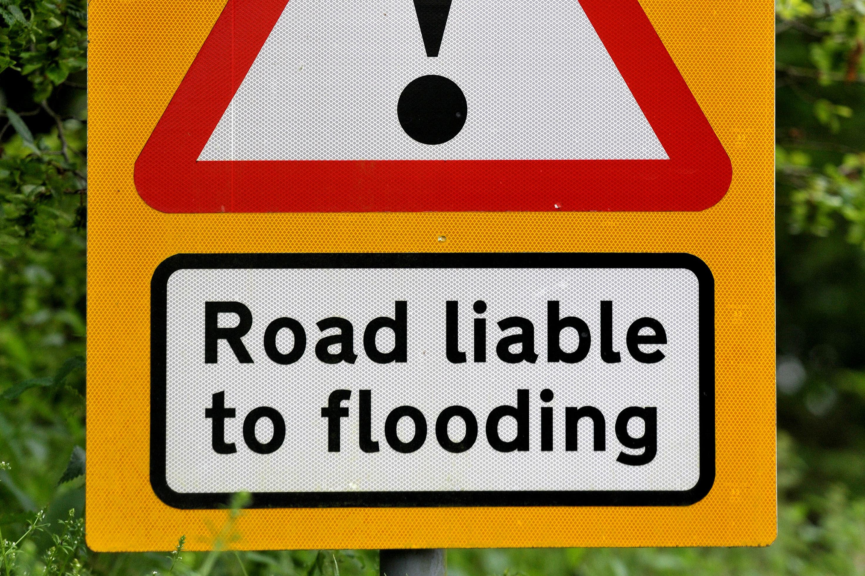 A road traffic sign warning of floods. The Environment Agency is highlighting the possibility of flooding this winter (Nick Ansell/PA)