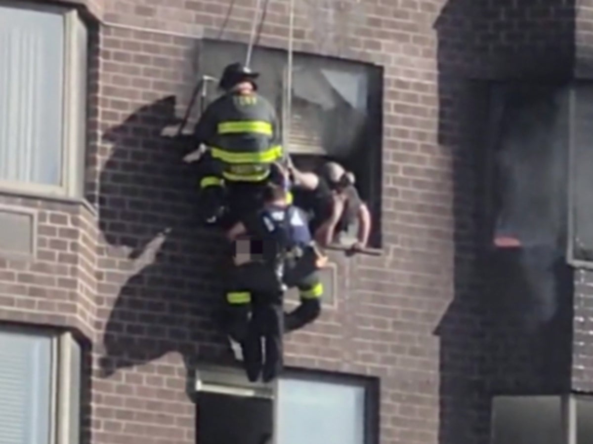 Woman filmed dangling from 20th-floor window in Manhattan high-rise fire recounts heartstopping rope rescue