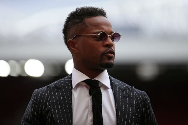 <p>Manchester United's Patrice Evra gives an interview on the pitch ahead of the Legends of the North football match between Manchester United Legends and Liverpool Legends at Old Trafford in Manchester, north-west England on May 21, 2022. (Photo by Lindsey Parnaby / AFP) (Photo by LINDSEY PARNABY/AFP via Getty Images)</p>